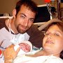 Happy Mom & Dad!<br /><br />Carey & Clint holding Caleb.<br /><br />                   